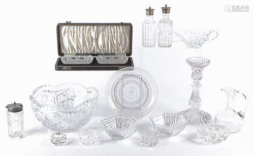 A large collection of 20th Century cut and moulded glass, comprising candlesticks, a fruit bowl,