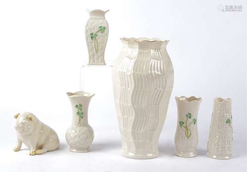 Six pieces of Irish Belleek porcelain to include a vase 'The Lagan Vase' of sinuous form, with