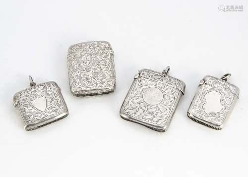 Four Victorian and later silver vesta cases, each engraved, three with fob loops, 5.5cm to 4.3cm (4)