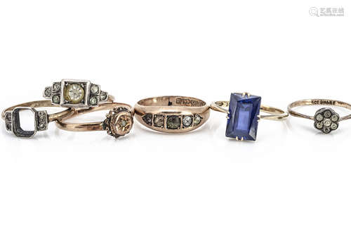 A collection of six gem set rings, comprising three 9ct examples and three 9ct and silver set