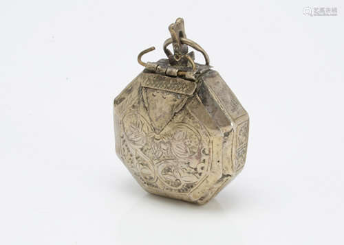 A 19th Century Middle Eastern white metal pendant container, 7.5cm high, octagonal with engraved