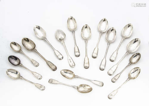 A set of nine Victorian silver fiddle and thread pattern dessert spoons by George Adams, together