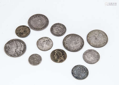 Eleven 17th and 18th Century British coins, including four half crowns, and four shillings, a six