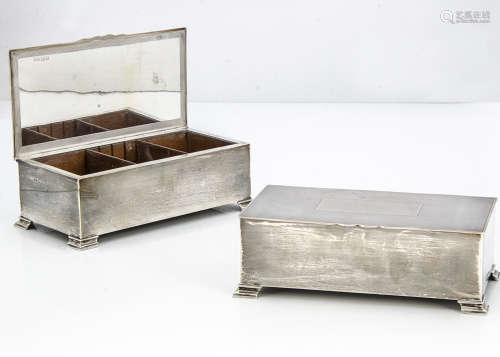 A pair of 1940s silver cigarette boxes from Mappin & Webb, each 18.5cm and approximately 20 ozt,