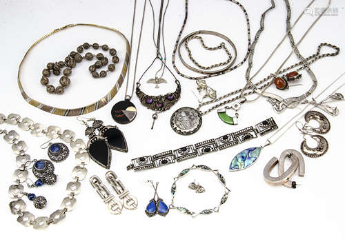 A collection of silver jewellery, including a graduated filigree bead style necklace, various