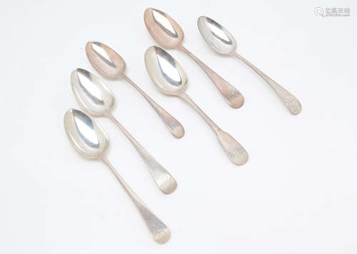 Six Georgian silver tablespoons, various ages and makers, one with bright cut handle, 11.8 ozt (6)