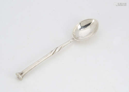 A 1930s silver coffee spoon from Omar Ramsden, square seal terminal on twist shaft with stylised rat
