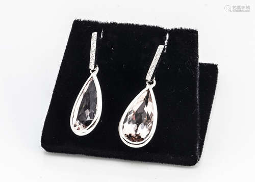 A pair of morganite and diamond drop earrings, the tear cut beryl drops on diamond set rectangular