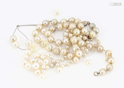 A string of cultured baroque pearls, 6.6mm knotted strung, 38cm, together with another uniform