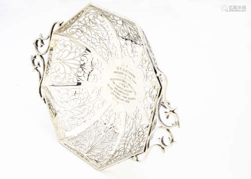 An Edward VII silver centre piece bowl, the pierced octagonal footed bowl with twin handles and