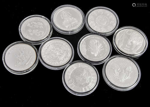 Nine modern 1oz fine silver coins, from around the globe such as a 2018 US dollar and a Cook