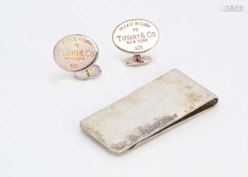 A pair of white metal cufflinks, marked Tiffany & Co, together with a silver plated money clip (3)