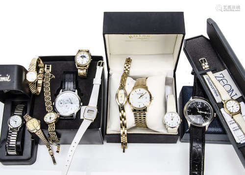 A collection of fashion watches, including a gilt Rotary in box and others