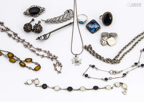 A collection of silver jewellery, including an onyx and marcasite dress ring, a pair of Maltese