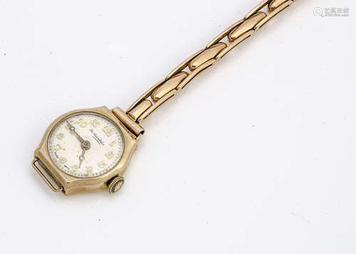 A c1930s 9ct gold cased lady's wristwatch, marked Tho Russells Son, on an expanding yellow metal