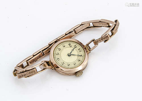 An Art Deco 9ct gold cased lady's wristwatch, 25mm case, appears to run, on yellow metal expanding