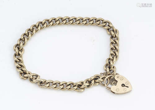 A 9ct gold curb linked and padlock clasp bracelet, with safety chain, 21cm, 23g