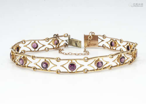 A 9ct gold amethyst bracelet, the rectangular links of pierced design centred with collet set