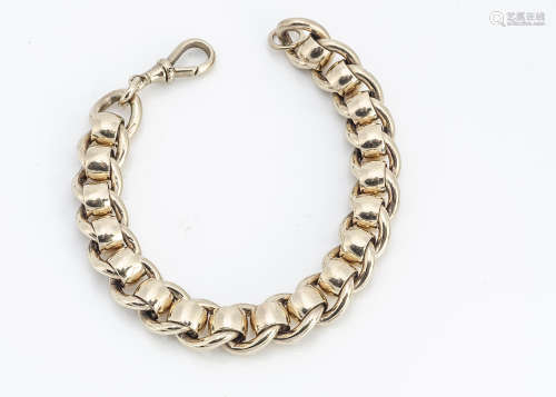 A heavy 9ct gold curb linked and circular collared bracelet, with snap clasp, with millennium