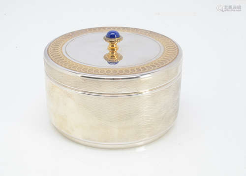 A fine modern silver circular box from Garrard & Co, 15cm diameter, 23.5 ozt, having engine turned