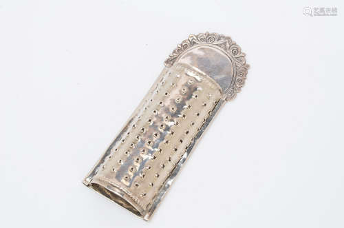 A Georgian period white metal nutmeg grater, 8.8cm, with slide out grate, leaf design to top, two