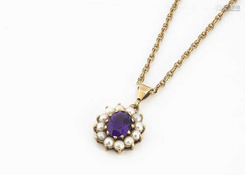 An amethyst and half pearl cluster pendant, in 9ct gold, supported on an oval linked 9ct gold