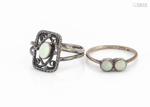 A 9ct gold opal ring, ring size N and an Art Deco white metal opal ring, the white opal in a