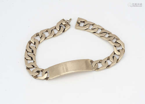 A 9ct gold identity bracelet, the flattened curb links with central curved rectangular plate,