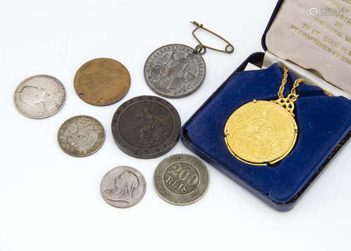 A small collection of coins and medallions, including an Edward VII coronation medallion, a