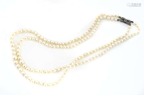 A cultured pearl and marcasite double row of pearls, of graduated form, largest 7.3mm, smallest 4.