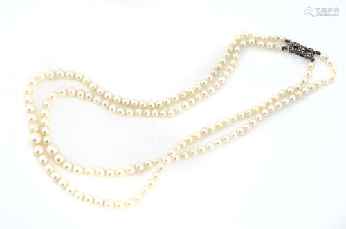 A cultured pearl and marcasite double row of pearls, of graduated form, largest 7.3mm, smallest 4.