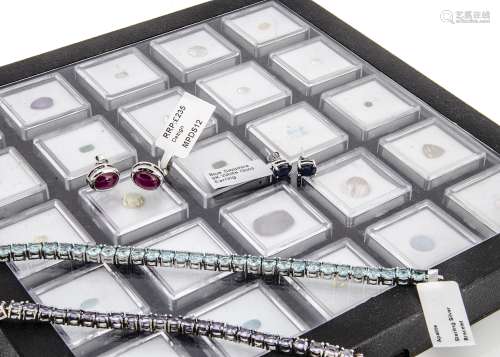 A collection of loose cut gemstones in presentation perspex cases, together with a quantity of