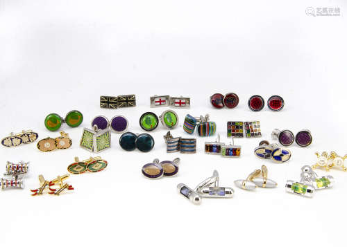 A collection of cufflinks, including various enamel and silver examples, other novelties such as