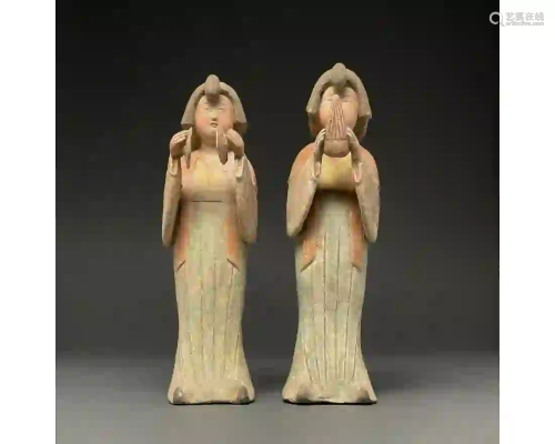 CHINA, TANG DYANSTY PAIR OF POTTERY MUSICIAN LADIES