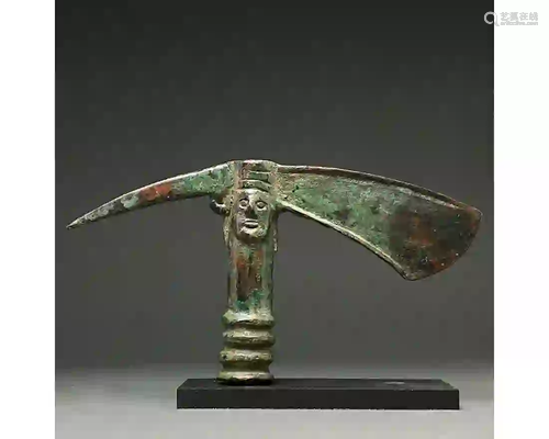 RARE BRONZE AGE BATTLE AXE WITH FACES