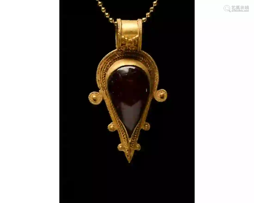 ROMAN GOLD AND GARNET PENDANT