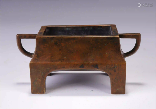 A CHINESE DOUBLE HANDLE FOUE FEET BRONZE CENSER