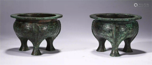 PAIR OF CHINESE BRONZE BEAST PATTERN TRIPLE-FOOTED