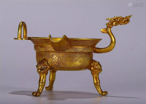 CHINESE GILT BRONZE TRIPLE-FOOTED DRAGON HANDLE CUP