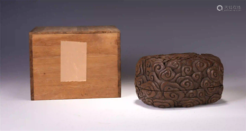 A CHINESE AGARWOOD YUN LONG CARVEN LIDDED BOX