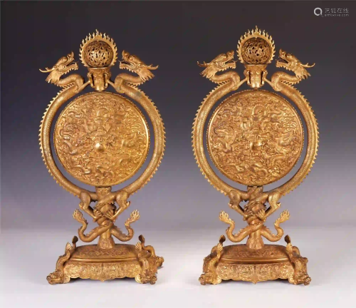 A PAIR OF CHINESE GILT BRONZE DRAGON PATTERN BI WITH