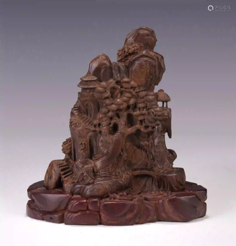 A CHINESE AGARWOOD CARVED SCHOLAR'S BOULDER TABLE…
