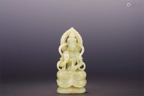 A CHINESE YELLOW JADE GUANYIN SEATED STATUE