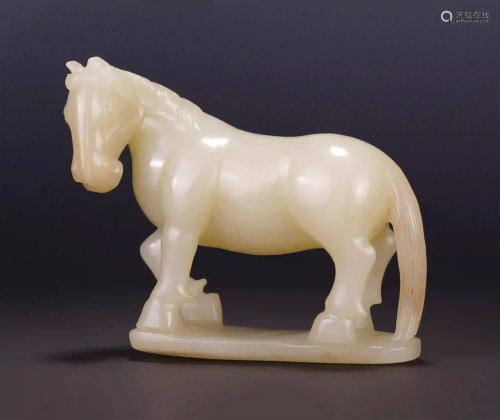 A CHINESE WHITE JADE STANDING HORSE ORNAMENTS