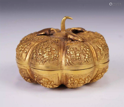 A CHINESE GILT BRONZE MELON SHAPED LIDDED BOX