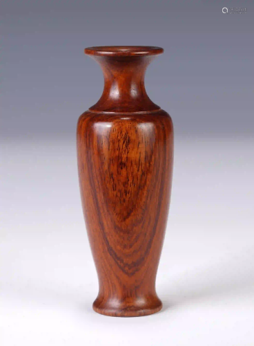 A CHINESE HUANG HUALI WOOD BOTTLE
