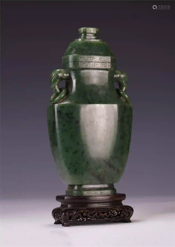 A CHINESE DOUBLE ELEPHANT HANDLE SPINACH JADE LIDDED