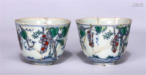 PAIR OF CHINESE BLUE AND WHITE DOUCAI FLORAL PATTERN CUPS, REBUILT