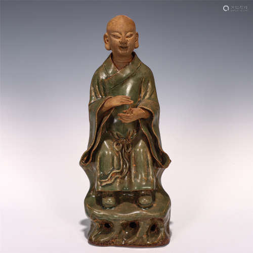 CHINESE PORCELAIN ARHAT WITH UNGLAZED HANDS AND HEAD