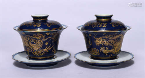 PAIR OF CHINESE BLUE GLAZE GOLD-PAINTED DRAGON PHOENIX BOWLS